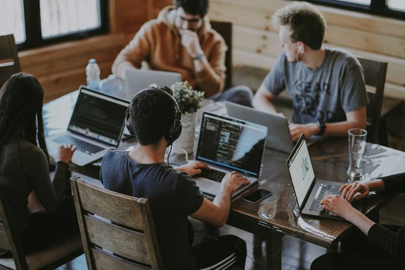 Professional team collaborating around a table
